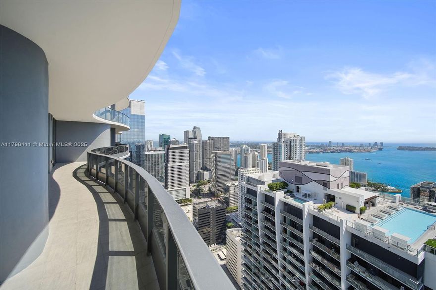 Enjoy privacy & exclusivity with this 56th floor Penthouse at the Brickell Flatiron. This home has panoramic views overlooking Biscayne Bay, the Atlantic Ocean, Miami Beach & the Brickell skyline. Upgrades include custom closets, custom cabinetry, lighting, automated blinds, wine storage & more. 10-foot high floor-to-ceiling glass windows, Snaidero kitchen cabinets, Miele appliances, two entries and a full length balcony accessible from each room. The 64th floor Sky Club amenities: resort style pool area, oversized fitness center with pilates/yoga room and a private spa/relaxation area. Add'l amenities: club room, lap pool, theater, lounge & club room. 24 hour valet, concierge, doorman and security. Located next to Mary Brickell Village & Brickell City Center. FULLY FURNISHED/Art Excluded