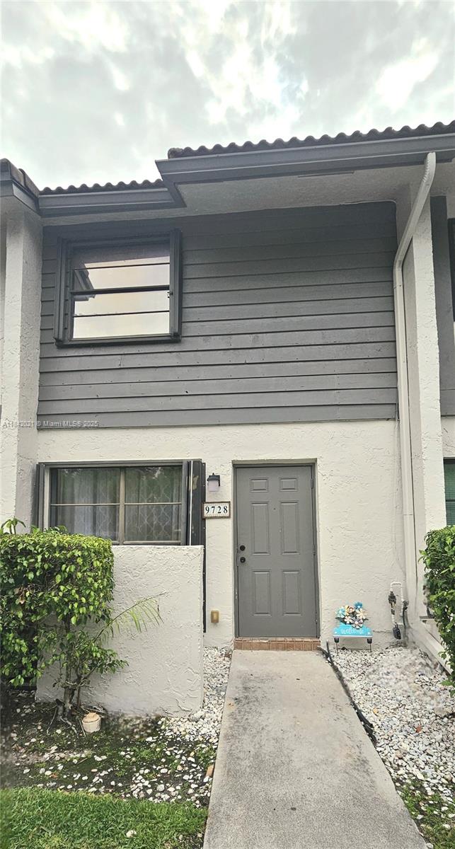 If you are looking for a great unit, at a great price in a great location, look no further! Rare find in a townhome that features an eat kitchen, a family room, a private patio, walk-in closet balcony off the master bedroom, a 2 bedroom split, tile and wood floors, granite countertop, stainless steel kitchen appliances. Accordion shutters through the property, and its own parking spot in front of the front door.! This quaint community has a swimming pool, and is located within walking distance to shopping areas, including grocery stores, dinning and the mall.