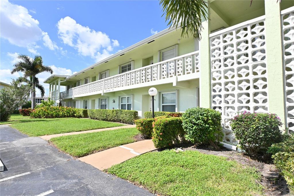 Photo of 1720 NW 19th Ter #203, Delray Beach, FL 33445 (MLS # A11794538)