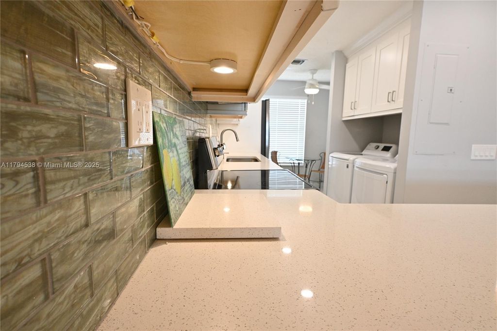 Photo of 1720 NW 19th Ter #203, Delray Beach, FL 33445 (MLS # A11794538)