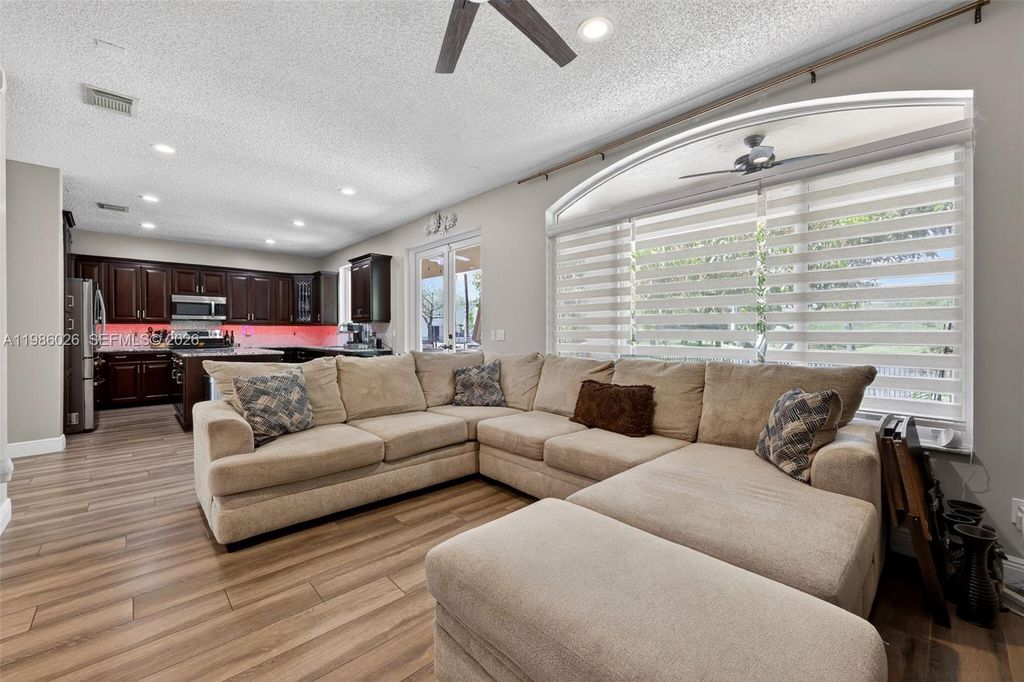 Photo of 1776 NW 78th Ave, Pembroke Pines, FL 33024 (MLS # A11986026)