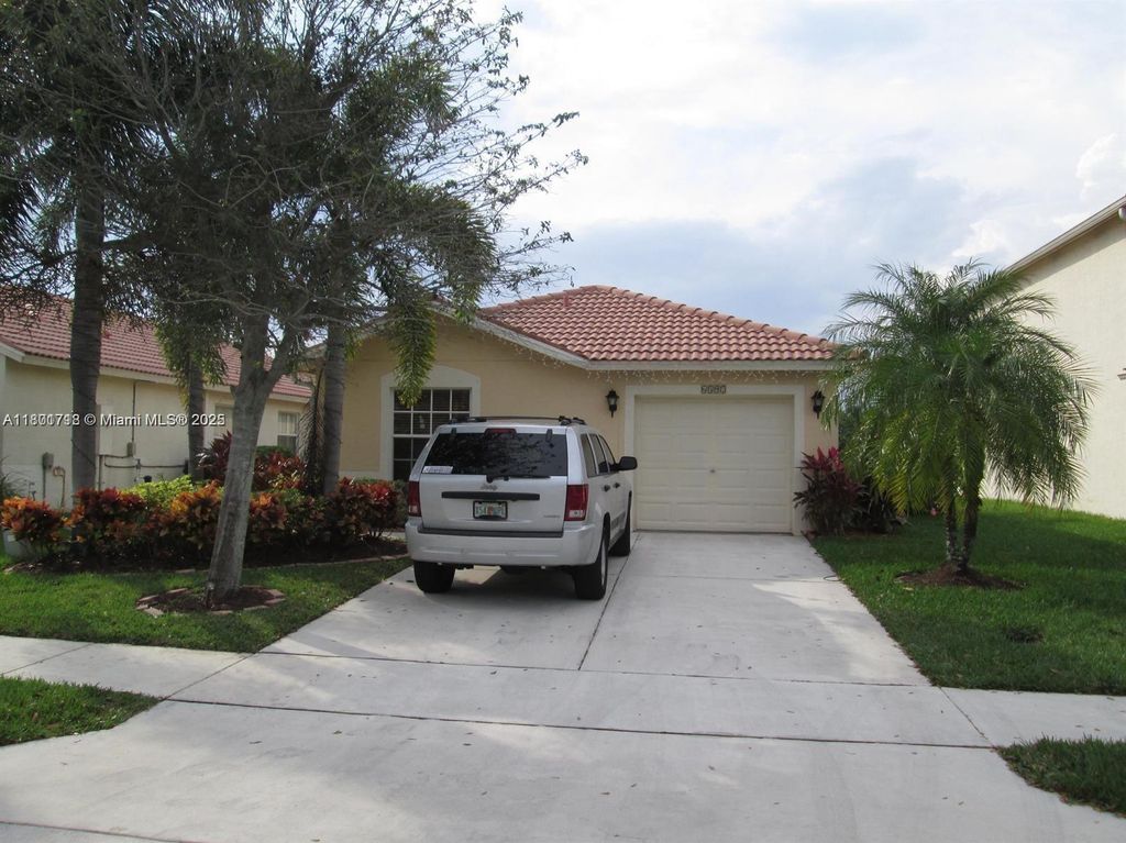 Photo of 6597 Country Winds Cv, Lake Worth, FL 33463 (MLS # A11801718)