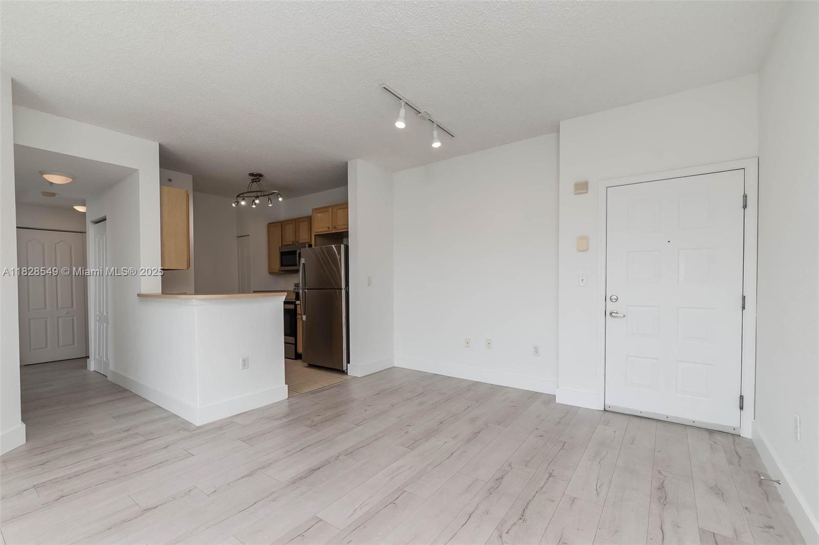 Bright and airy top-floor 2-bedroom, 1-bath unit with west-facing sunset views and luxury laminate flooring throughout. Features include in-unit washer/dryer and one assigned garage parking space. Centrally located near UM, Larkin Hospital, Coral Gables, Coconut Grove, and Downtown South Miami, with easy access to Metrorail, bus lines, and major highways. Enjoy building amenities like a pool, fitness center, and 24-hour security. Tenant occupied—advance notice required for showings.
