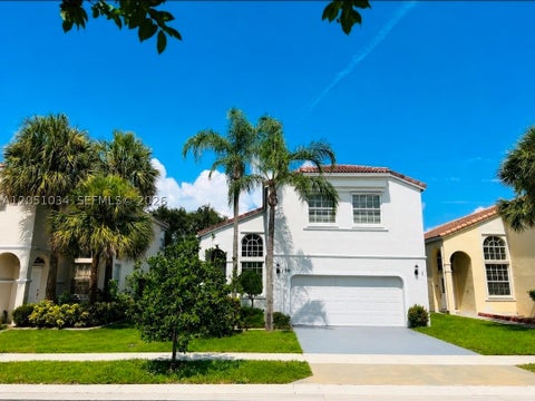 Photo of 150 NW 151st Ave, Pembroke Pines, FL 33028 (MLS # A12051034)