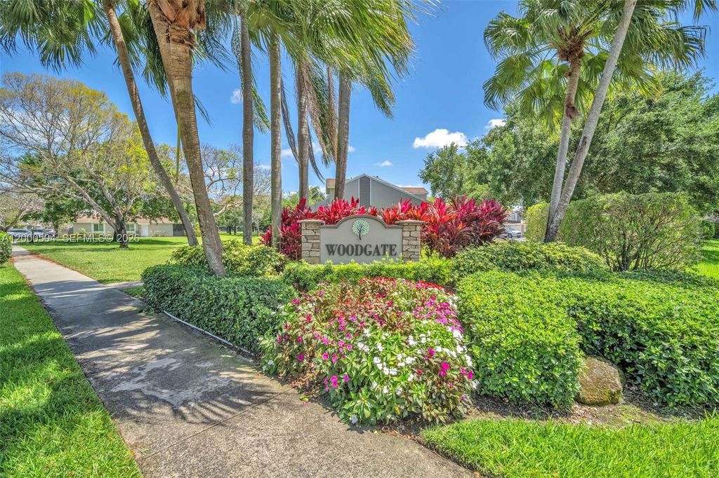 Photo of 15743 Woodgate Pl #E, Sunrise, FL 33326 (MLS # A12000504)