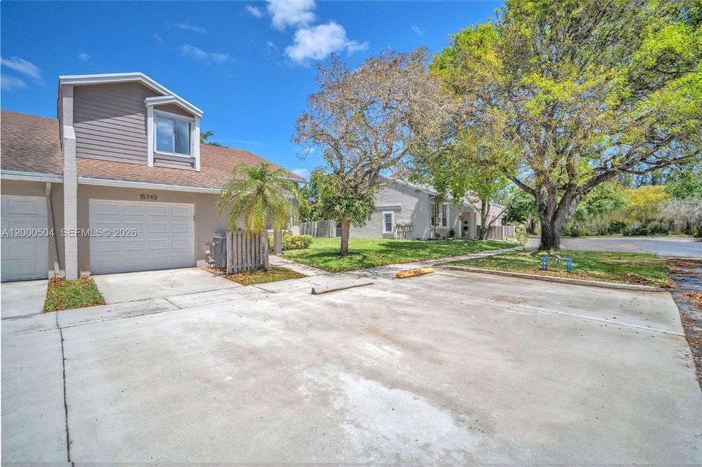 Photo of 15743 Woodgate Pl #E, Sunrise, FL 33326 (MLS # A12000504)