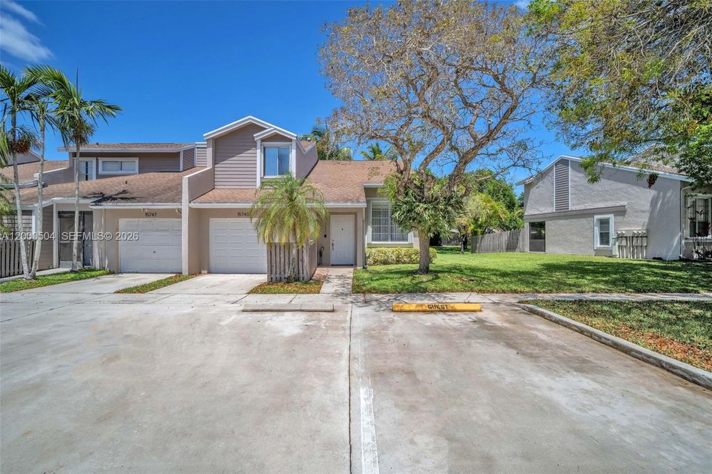 Photo of 15743 Woodgate Pl #E, Sunrise, FL 33326 (MLS # A12000504)