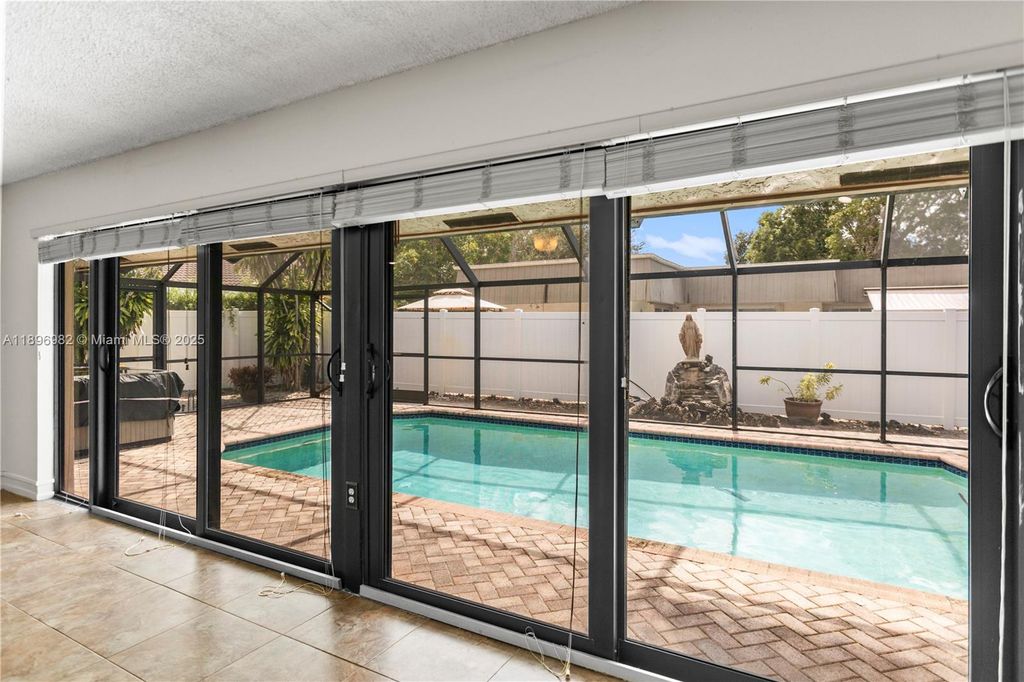 Photo of 10410 SW 50th Pl, Cooper City, FL 33328 (MLS # A11896982)