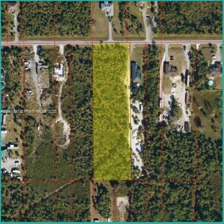 More than 2.5 acres of land. GREAT PRICE! Build your dream home here.