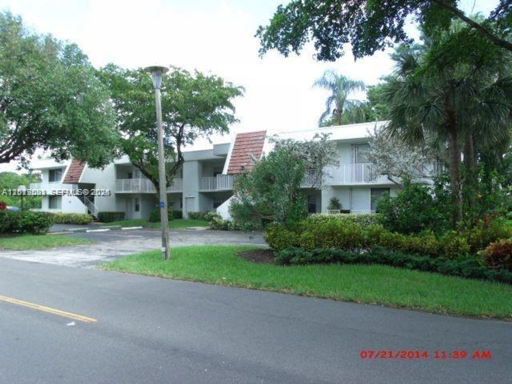 Photo of 3145 N Palm Aire Dr #103, Pompano Beach, FL 33069 (MLS # A12017091)