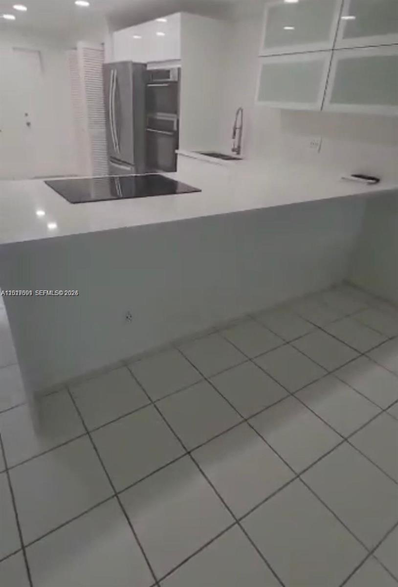 3145 N Palm Aire Dr 103