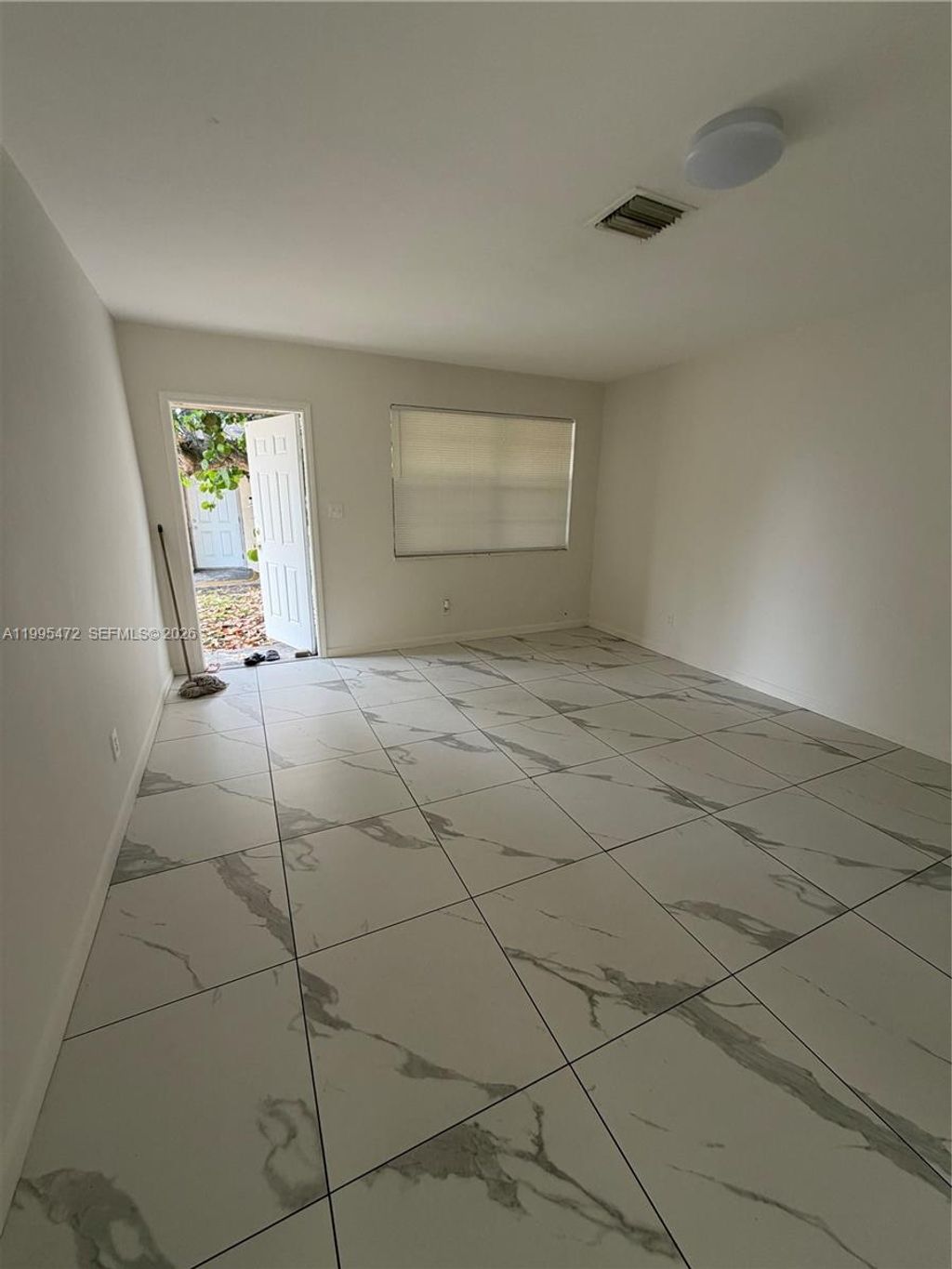 Photo of 2851 NW 15th Ct #1, Fort Lauderdale, FL 33311 (MLS # A11995472)