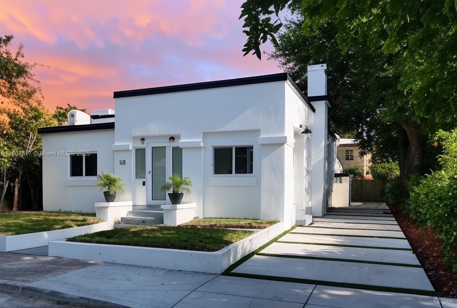 Welcome to your South Miami sanctuary. A fully renovated 3-bed, 2-bath home in Buena Vista, just north of Wynwood and a short walk from the Design District. You're 10 minutes from Downtown Miami and Miami Beach. Enjoy vibrant dining, art, and upscale shopping with easy access to major routes. This 5,000 sq. ft. lot offers luxury features, including a new kitchen, spa-like bathrooms, a new roof, HVAC system, and hurricane-resistant windows. Start mornings with fruit trees and unwind in comfort.
Whether it's a primary residence, an investment, or a pied-Ã -terre, this renovated home is competitively priced in a prime location. This is your opportunity to secure a premier piece of Miami real estate. Contact us today for your private showing.