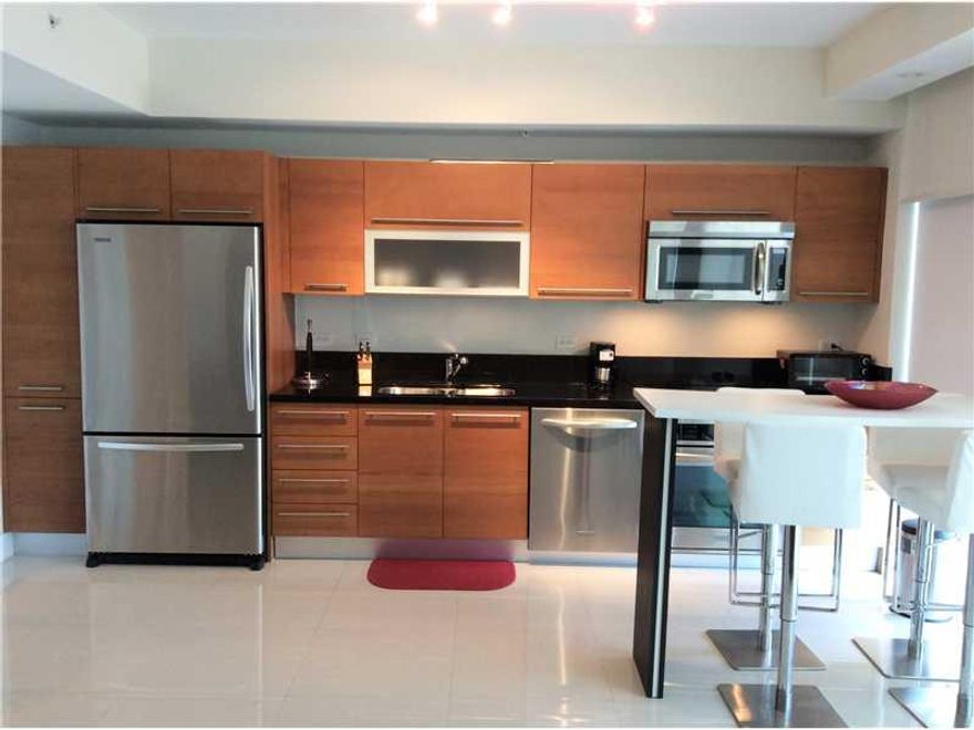 Incredible view from this large Studio on the 31th floor facing directly to the Bay and the Ocean. Turnkey with everything in it.  All you need to bring is your clothes.   Beautiful decorated with a murphy bed that gives you the feel of a real large comfo rtable unit.  All the appliances of  a regular unit, Snaidero cabinets.  Great unit for a professional working downtown.