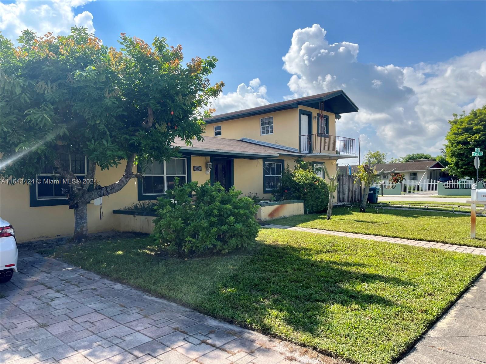 Perfect opportunity to own this nicely maintained 5beds, 3baths, detached single home located in the heart of Miami. This charming home has 2,689 sq ft of living area and large fence with double doors gate. The home lay-out greets you as you enter through the living/dining room. Tiles throughout and the kitchen overlooks a breakfast nook with sliders to the enclosed porch area. The private and spacious master room easily fits a king size set and has an attached bath with tiled walk-in shower. The other 2 rooms are adjacent the living room area. 2 story guest house currently rented month to month built on the side. Cemented backyard and fruit trees. Home also features new roof 2022, water heaters, A/C, washer and dryer and much more. Centrally located between Miami Gardens and Miami Lakes.