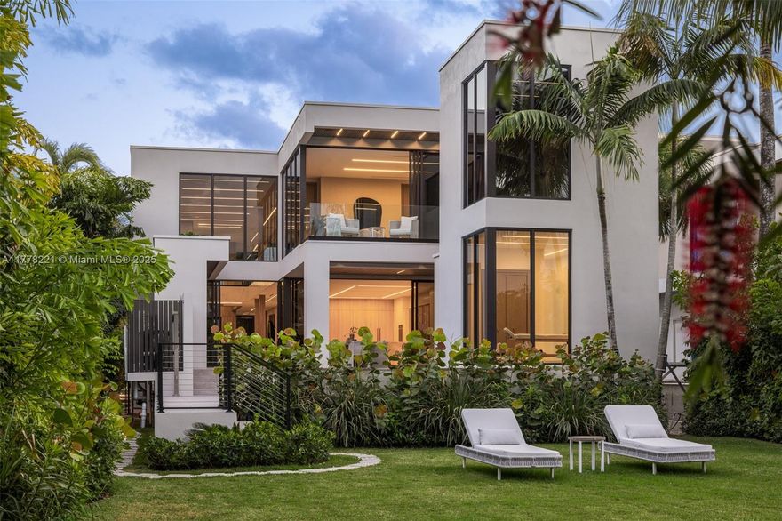 Introducing a rare waterfront masterpiece on the exclusive Belle Meade Island, designed for those who value architecture, design, and functionality at the highest level. This brand-new 8,210 SF home on a 17,000 SF lot features a new seawall, 50-ft dock, & direct bay access. A dramatic pivot door and floor-to-ceiling high impact glass create a striking entrance. Inside: 10–11 ft ceilings, Mont Blanc Quartzite porcelain floors, and a chef’s kitchen with Taj Mahal Quartzite island, DellAnno cabinetry, Sub-Zero, Wolf, and more. Includes 6 bedrooms, 7.5 bathrooms, elevator, movie theater, gym, sauna, office, spa room, and 3-car A/C garage. Upstairs: luxe primary suite, media room, terrace. Outdoors: heated pool, jacuzzi, and large backyard with lush private landscaping lush.