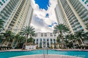 2 bedroom, 2 bathroom condo available for annual lease. Unit features split floor plan, tile floors, stainless steel appliances, granite countertops, and in-unit washer/dryer. Balcony faces city and pool area. Building includes amenities such as fitness center, swimming pool, 24-hour security, and valet service. Located near public transportation, shopping, and dining. Rapid HOA approval process. Available for immediate occupancy.