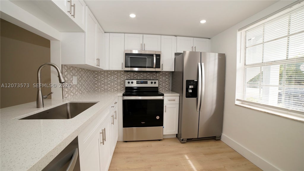 Photo of 4291 NW 9th Ave #101, Deerfield Beach, FL 33064 (MLS # A12073573)