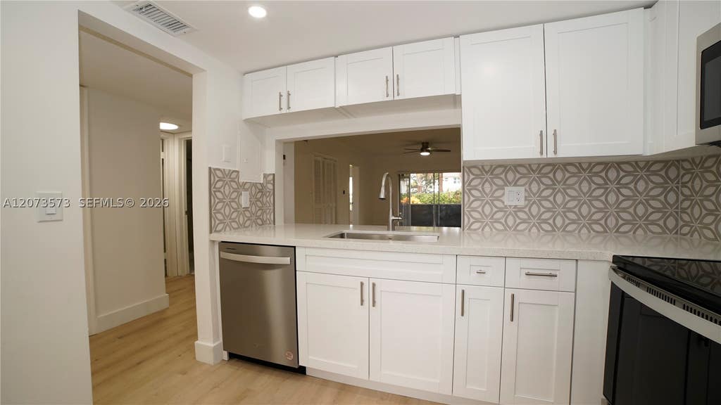 Photo of 4291 NW 9th Ave #101, Deerfield Beach, FL 33064 (MLS # A12073573)