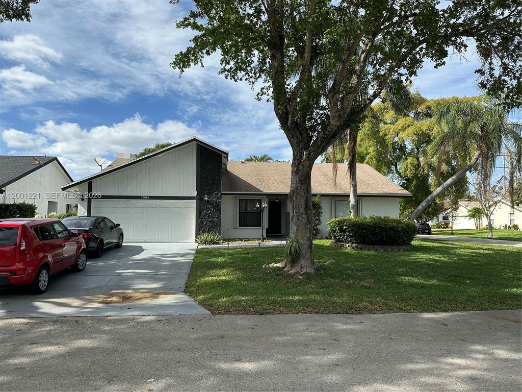 Photo of 7003 NW 40th Pl, Coral Springs, FL 33065 (MLS # A12001221)