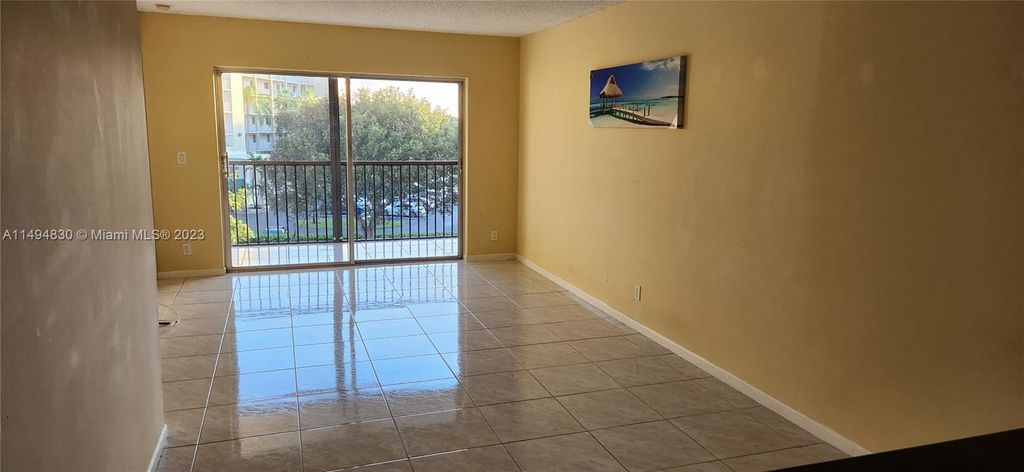 Photo of 2230 N Cypress Bend Dr #403, Pompano Beach, FL 33069 (MLS # A11494830)