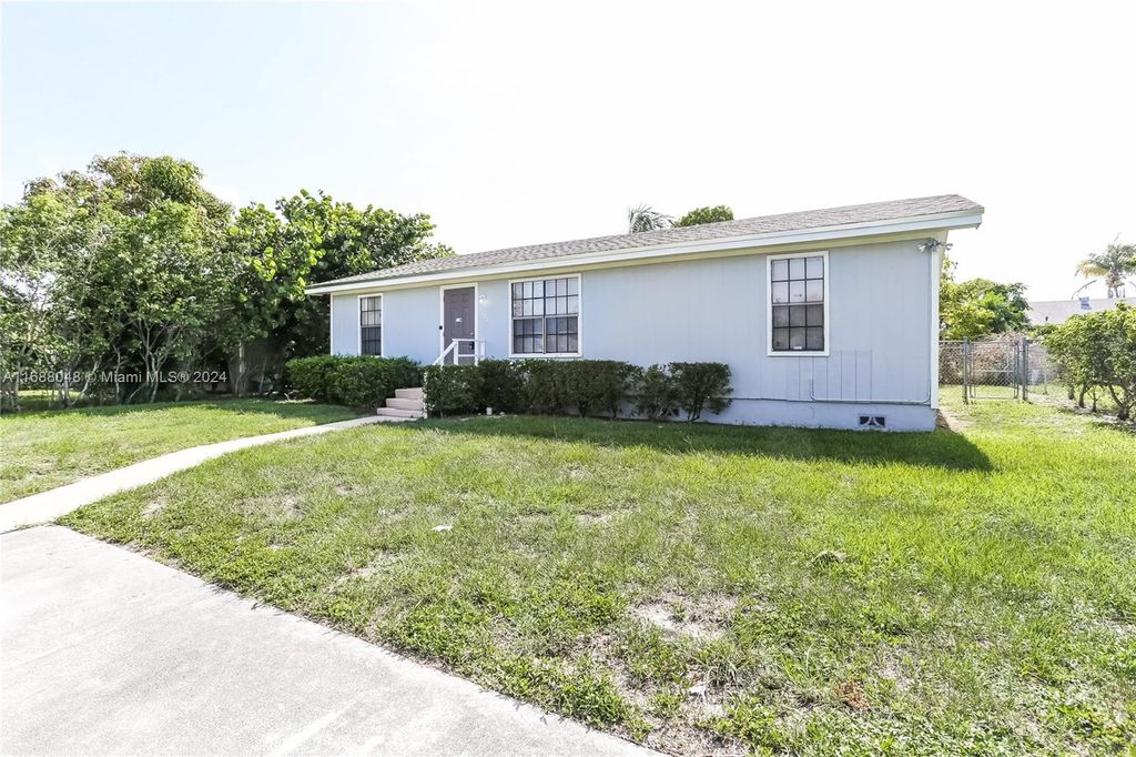 Photo of 7303 Thatcher Ave #0, Lake Worth, FL 33462 (MLS # A11688048)