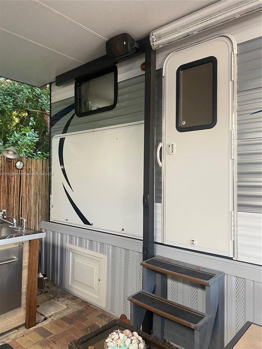 Beautiful RV home in the desired area of Calusa Campground. Manny amenities in the community, boat ramp, community pool, overnight docking, playground, basketball court, and many more. Short rents are allowed with Airbnb and Vrbo. Already registered with those apps getting generous monthly income. .This is an corner lot with space where to park a boat.