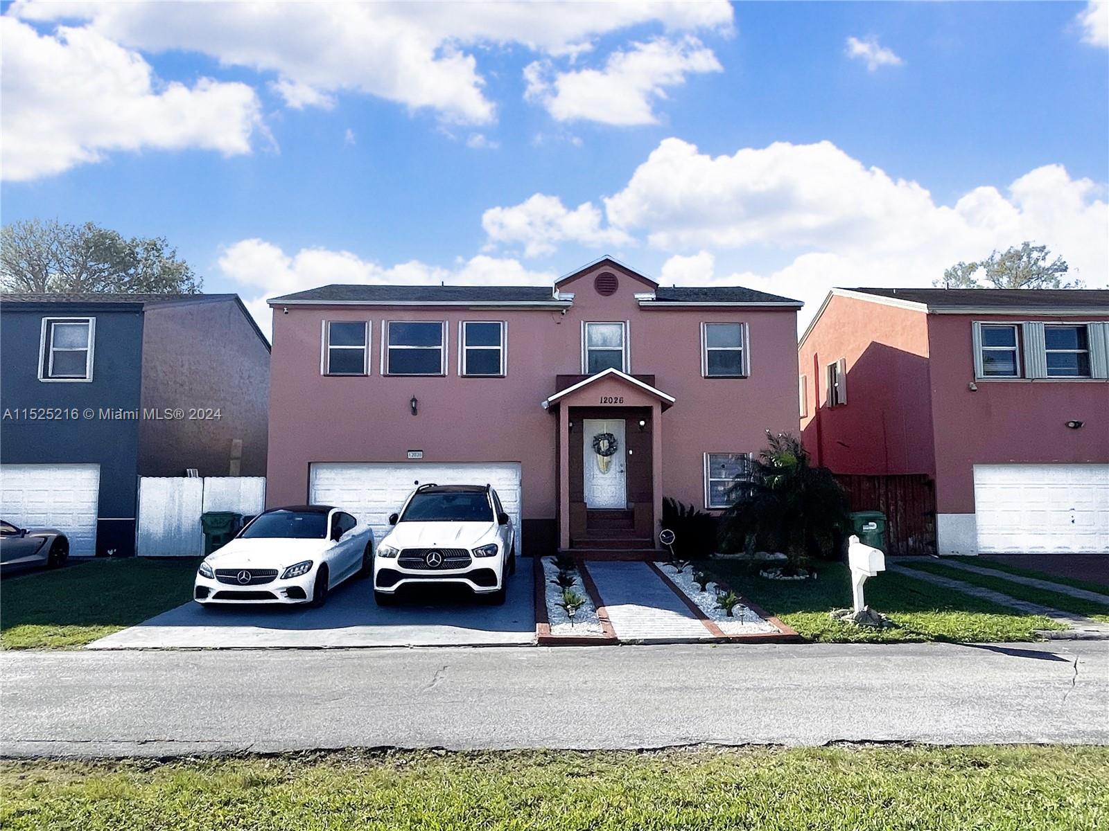 THE MOST BEAUTIFUL TWO STORY 2 CAR GARAGE! 5BD/2.5BA.. THE 5TH BEDROOM WAS CONVERTED TO A LIVING ROOM. PROPERTY HAS BEEN FULLY UPDATED! IN THE HEART OF HOMESTEAD. (1726SQFT) LIVING AREA. NEW UPDATED KITCHEN WITH SS/APPLIANCES, QUARTZ COUNTERTOPS ISLAND. TILES THROUGHOUT. UPSTAIRS LAMINATE WOOD FLOORS. ALL HURRICANE IMPACT DOORS, WINDOW PANNELS UPDATED MASTER BATHROOM WITH DIGITAL LIGHT SWITCH AND WALK-IN CLOSET. AND A COVERED OUTDOOR TERRACE OVERLOOKING YOUR BEAUTIFUL LARGE BACKYARD OUTDOOR KITCHEN TO HOST GATHERINGS WITH FRIENDS. PRIVATE GATED COMMUNITY WITH SECURITY GUARD. A MUST SEE! THIS PROPERTY IS MOVE IN READY.