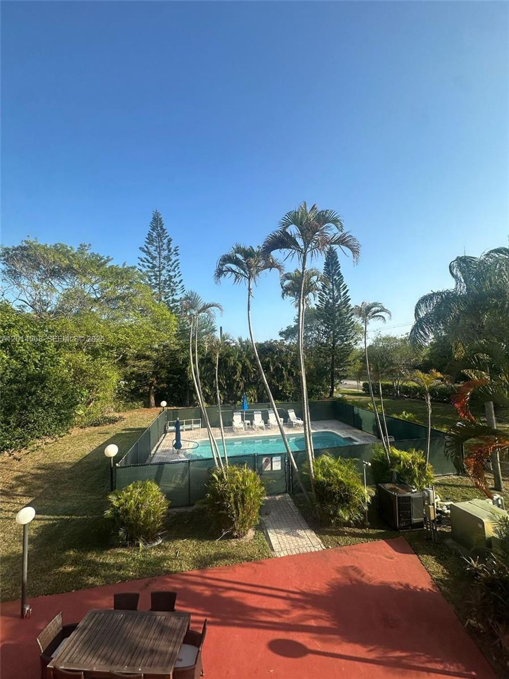 Photo of 3910 Crystal Lake Dr #201, Deerfield Beach, FL 33064 (MLS # A12014568)