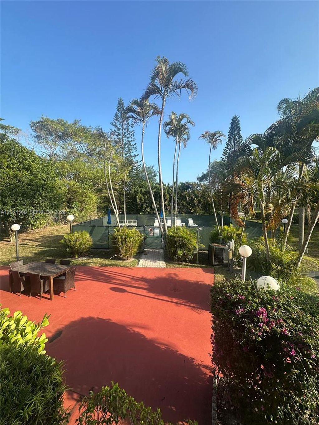 Photo of 3910 Crystal Lake Dr #201, Deerfield Beach, FL 33064 (MLS # A12014568)
