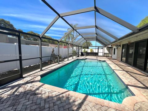 Photo of 10410 SW 50th Pl, Cooper City, FL 33328 (MLS # A11850098)