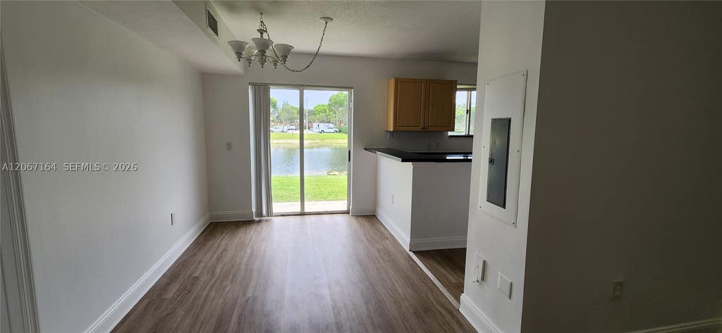 Photo of 3478 Briar Bay Blvd #106, West Palm Beach, FL 33411 (MLS # A12067164)
