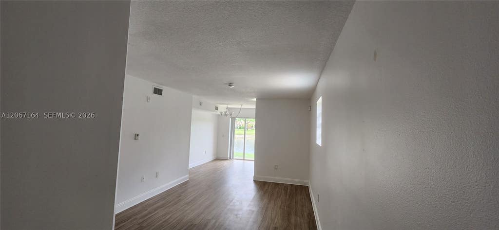 Photo of 3478 Briar Bay Blvd #106, West Palm Beach, FL 33411 (MLS # A12067164)