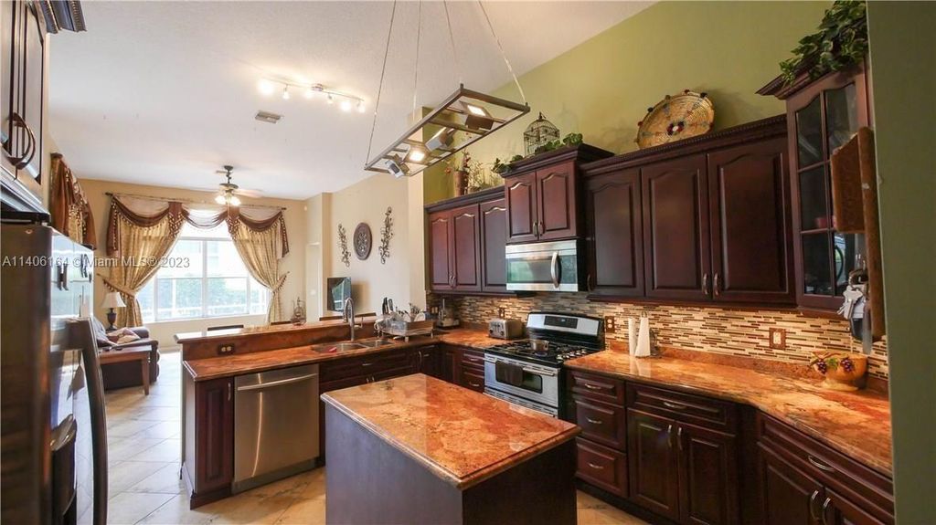 Photo of 6373 SW 191st Ave #6373, Pembroke Pines, FL 33332 (MLS # A11406164)