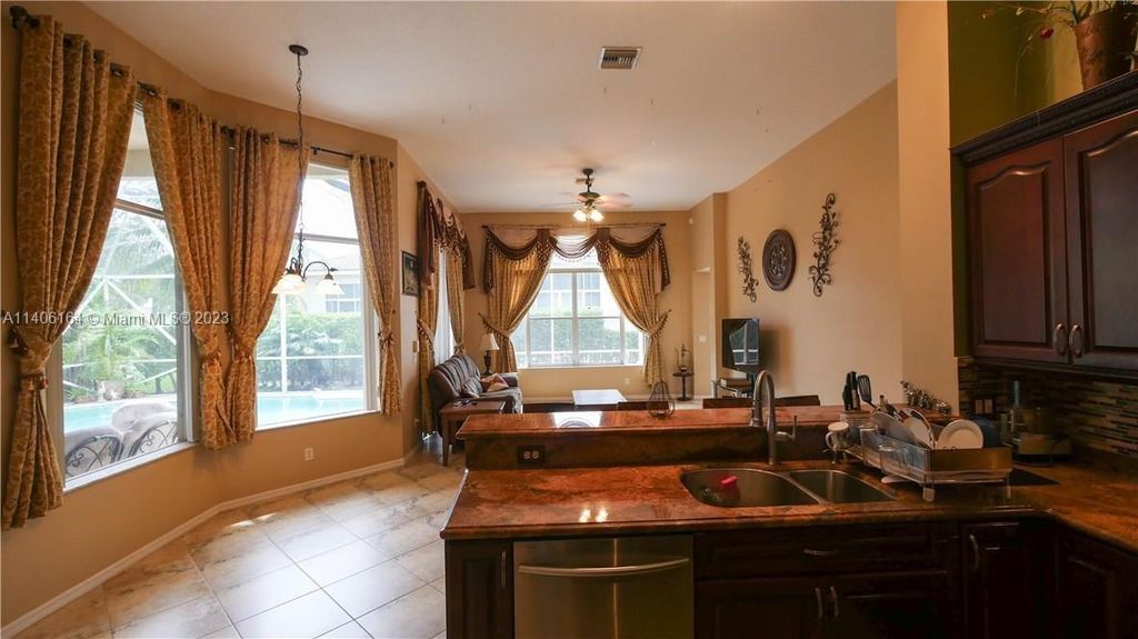 Photo of 6373 SW 191st Ave #6373, Pembroke Pines, FL 33332 (MLS # A11406164)