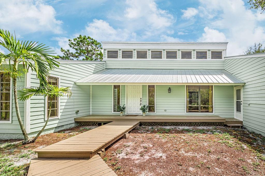 Unlock the potential of this COASTAL RETREAT in desirable ROCKY POINT community.This 3 bed/2 bath home is sitting on a generous ½-ACRE lot, offering endless opportunities for personal use or short-term rental income. Featuring a split floor plan, parquet floors, and an entertainer’s kitchen, it comes with great updates already in place—METAL ROOF,AC (2022), and a SOLAR WATER HEATER.The EXPANSIVE WOODEN DECK overlooks a SPACIOUS BACKYARD, perfectly suited for gardens, a pool, or transforming into your own private outdoor oasis.
Surrounded by waterways, scenic boardwalks, and parks perfect for birdwatching, fishing, and boating. With convenient access to boat ramps and waterfront restaurants, every day feels like a vacation.Don’t miss this opportunity to own a slice of coastal paradise!