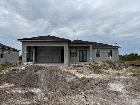 Photo of 914 Manresa Ave S, Lehigh Acres, FL 33974 (MLS # A11912910)