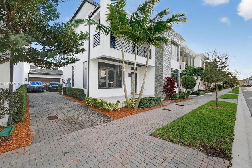 Experience elevated living in this fully upgraded luxury residence located in the highly sought-after Downtown Doral community. Thoughtfully designed with elegant porcelain flooring, custom wood accent walls, and sophisticated contemporary finishes, this home offers the perfect blend of style, comfort, and functionality.

The chef-inspired kitchen features premium appliances, modern cabinetry, and high-end countertops, creating an ideal space for both everyday living and entertaining.

Step outside to your private resort-style backyard with a heated pool, designed for relaxation and outdoor enjoyment year-round. Additional premium features include a Tesla EV charger, whole-house water purification system, and integrated surround sound throughout the home.

A converted garage currently serves as a versatile game room and flex space, perfect for a home gym, media room, or lounge area. The extended driveway comfortably accommodates up to 5 vehicles.

Offered furnished or unfurnished, this move-in-ready residence presents a rare opportunity to own a truly turn-key luxury home in one of Doral’s premier neighborhoods.

Conveniently located just minutes from Downtown Doral’s top restaurants, shopping, parks, major highways, and highly rated schools.

Private showings by appointment.