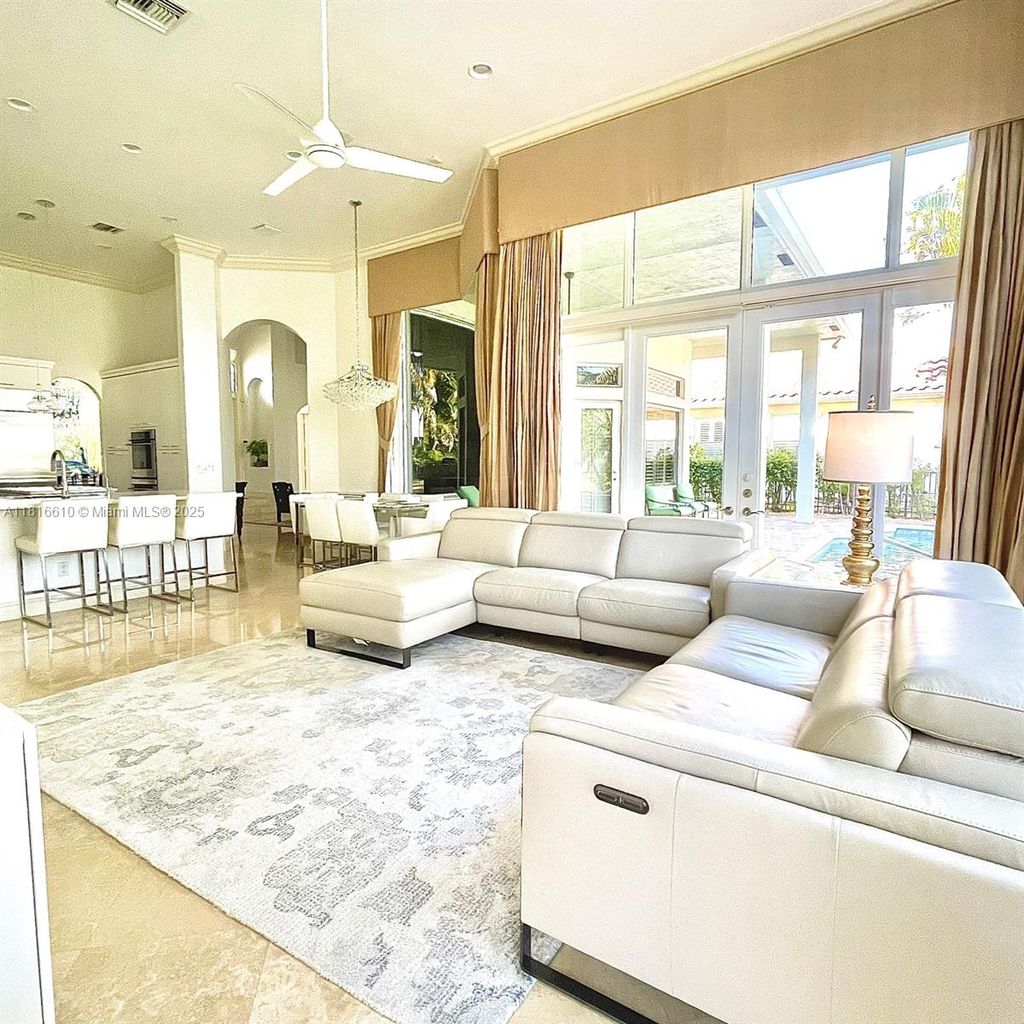 Photo of 690 Baldwin Palm Ave, Plantation, FL 33324 (MLS # A11816610)