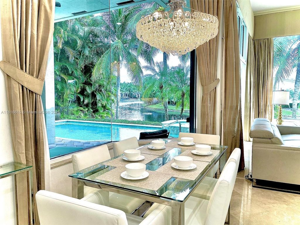 Photo of 690 Baldwin Palm Ave, Plantation, FL 33324 (MLS # A11816610)