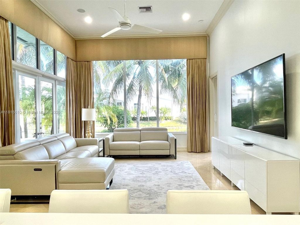 Photo of 690 Baldwin Palm Ave, Plantation, FL 33324 (MLS # A11816610)