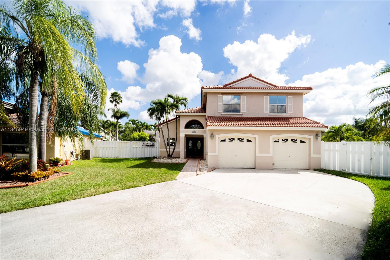 4 Bedroom 2.5 Bath. READY TO MOVE IN. Everything taken care. BRAND NEW TILE ROOF. NEW Mohawk Laminate Flooring with padding in Bedrooms and Stairs, Freshly PAINTED INSIDE AND Outside with neutral colors . NEW AC Unit installed, garage openers installed. Must SELL. All Bathrooms are Newly Remodeled with Italian Porcelain tiles, New Vanities with Quartz and top quality fixtures. Glass shower doors. Do not miss this one. Home is spacious with formal living, dining and family room. High ceilings, large windows and sliding glass doors allow plenty of natural light. 2 Car garage and a very long driveway. Granite Kitchen, Whirlpool Stainless Steel appliances and Newer Water Heater. Very spacious backyard. Gated community, Tennis Courts, Playground etc