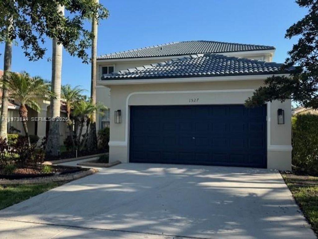 Photo of 1527 Winterberry, Weston, FL 33327 (MLS # A11973834)