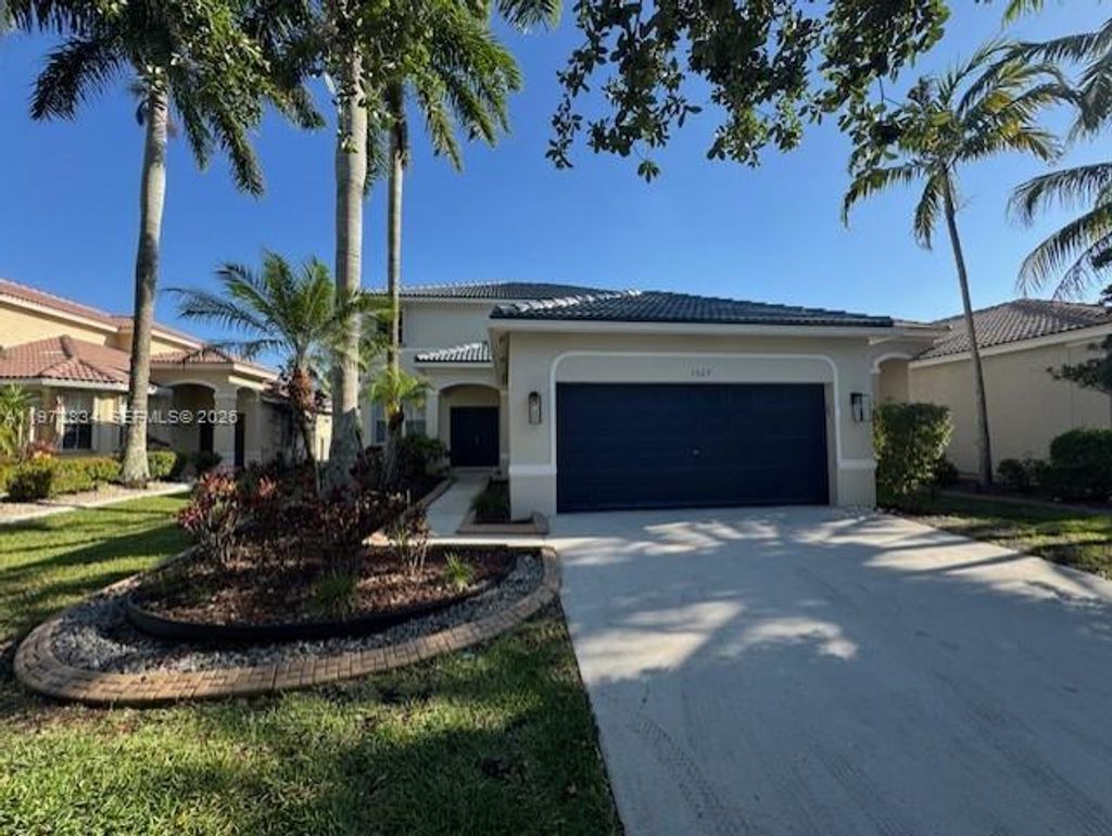 Photo of 1527 Winterberry, Weston, FL 33327 (MLS # A11973834)