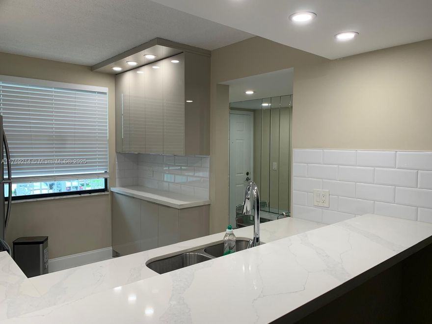 Newly renovated and fully furnished 2-bedroom + den, 2-bathroom residential property in prime Boca Raton location. Features include brand new tile floors, full dining area, and large smart TV in living room. Laundry room with full-size washer and dryer in unit. Quiet community with pool, elevator access, and security. Includes 1 assigned parking space and complimentary guest parking. Close to schools, parks, beaches, and Town Center Boca Mall.
