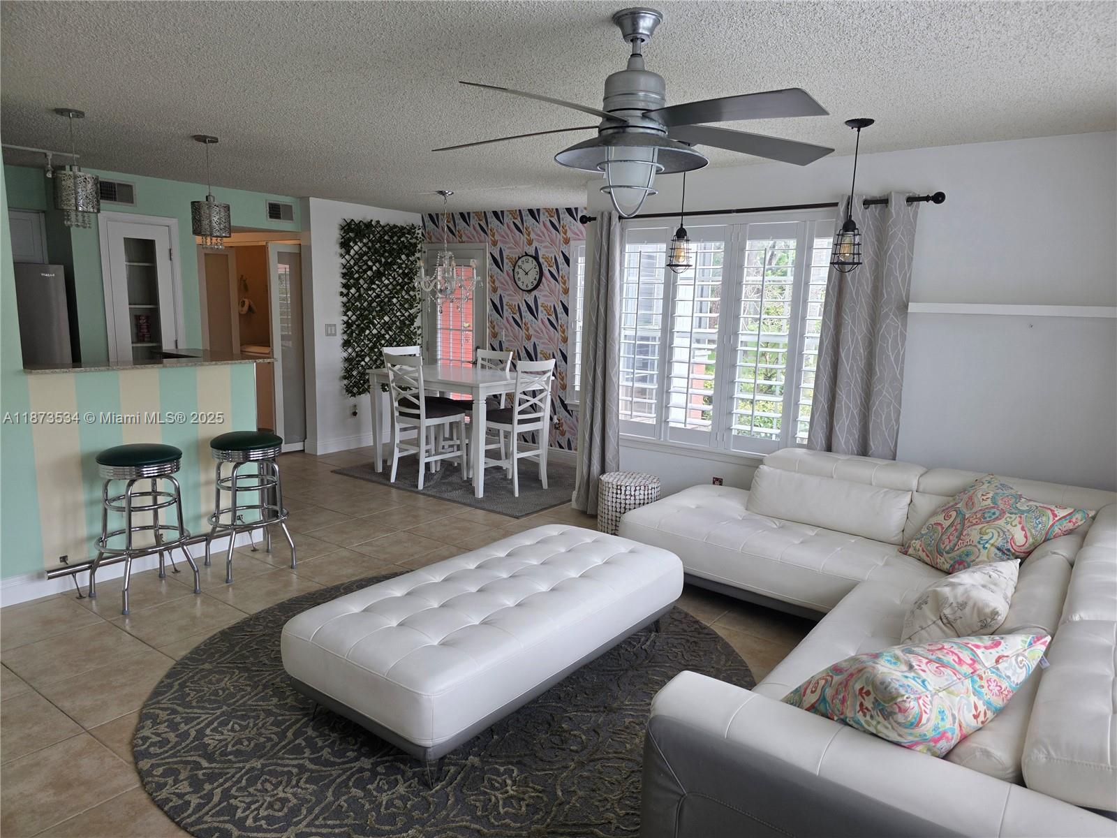 Beautifully Updated 1st Floor Condo with Serene Lake Views. Step into this beautifully updated 2-bedroom, 2-bath first-floor condo, perfectly situated in a peaceful lakefront setting with a highly convenient location. Enjoy the ease of indoor-outdoor living on the charming screened-in porch—ideal for morning coffee or relaxing evenings. Thoughtfully designed for comfort and versatility, this spacious unit is available furnished or unfurnished, making it the perfect place to call home. Residents also enjoy access to fantastic community amenities, including a swimming pool, jacuzzi, tennis courts, sand volleyball, and barbecue areas—perfect for entertaining or simply enjoying an active, resort-style lifestyle. Pets under 40lbs allowed. Also available for rent. Vacant and easy to show.