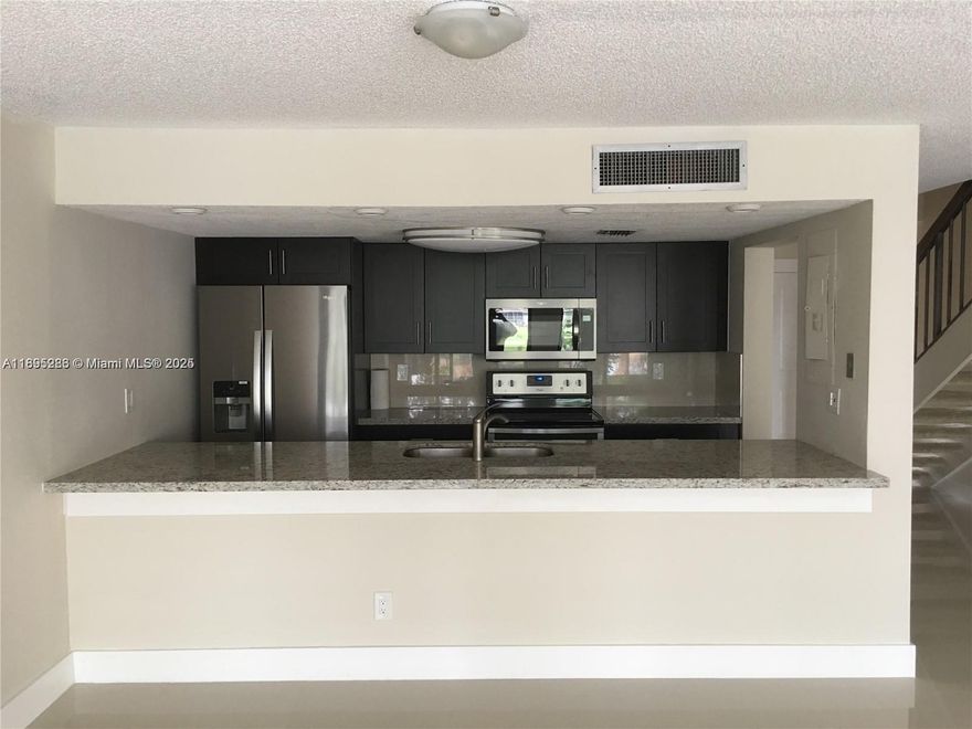 Discover this beautifully upgraded townhouse in the heart of Pembroke Pines! Ideally located in a family-friendly community, this 2-bedroom, 2-bathroom home offers comfort, convenience, and style — perfect for families or anyone seeking central, easy living.
Enjoy a thoughtful layout with one bedroom and full bathroom located on the main floor for added accessibility. The spacious living area flows into an updated screened patio, ideal for relaxing or entertaining outdoors year-round.
This home is just minutes from top-rated schools, shopping malls, and everyday amenities, making it an unbeatable location for modern living.
Don't miss your chance to call this charming townhouse your new home!