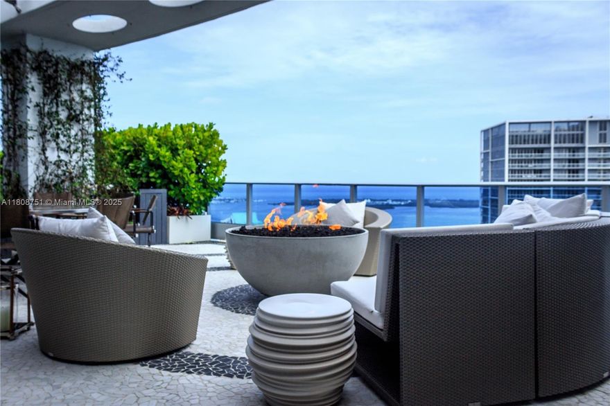 Experience elevated living in this professionally designed, ultra-luxury two-story penthouse at EPIC in Downtown Miami. Spanning over 6,000 SF of total space, this stunning residence offers 3 bedrooms, 5.5 bathrooms, and breathtaking bay, river, and skyline views. Fully furnished and curated with exquisite taste, it features rich wood and marble flooring, designer lighting, custom furnishings, and a sculptural spiral staircase as its centerpiece. Expansive terraces and 5-star building amenities — including valet, spa, fitness center, and rooftop pool — complete this extraordinary lifestyle offering. One of Miami’s most exceptional penthouses.