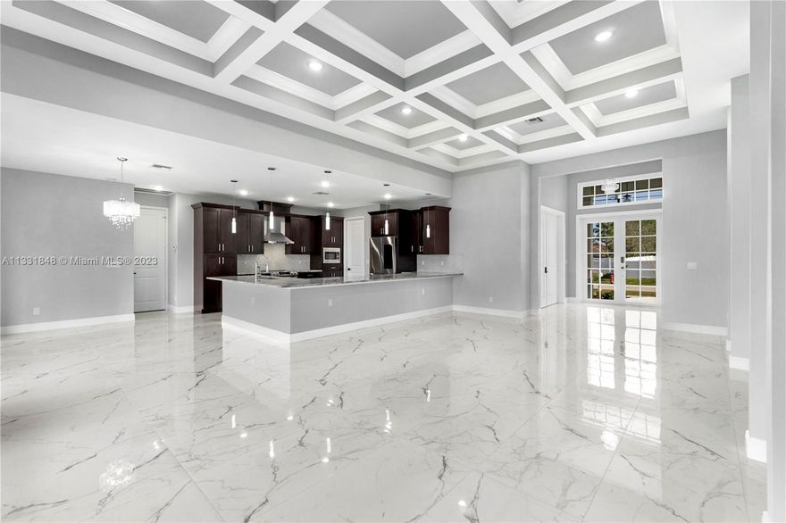 Be the first one to move into this brand new construction in St Lucie County; modern meets tradition, ample 4 beds | 3 ba, plus office lake house. Double door entry-foyer with high coffered ceiling, remote control fireplace, 8 ft doors, ceramic floor throughout, state of the art open kitchen interacting with dining and living areas. Kitchen features an extra large granite island countertop, smart appliances, and chef's hood. Master bathroom w double sink, massage shower and tub. Watch beautiful sunsets on a covered patio facing the lake. Close drive to restaurants, retail, beaches, movies, hospitals, I-95 and high rated schools. Live, work at this one of a kind opulent residence.