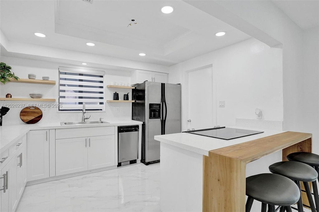 Photo of 1355 Madison St, Hollywood, FL 33019 (MLS # A12026237)